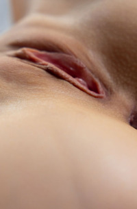 Pandora Red Tantalizes With A Sensuous Striptease Unveiling Her Perky Breasts And Bare Feet