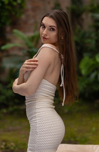 Monika May Teases And Tantalizes Alone In The Garden As She Uncovers Her Desires