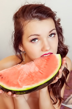 Iva - Sucking on a watermelon naked inside of a hotel room