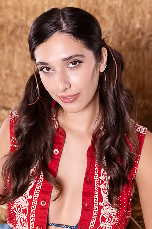 Aria Sloane American Brunette Swishes Her Long Pigtails With A Sassy Smile