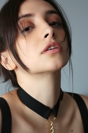 Olivia Linz Her Passionate Gaze Conveying Her Erotic Thoughts