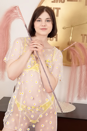 Sara Celeste Bending Over To Show How Her Thong Panties Nestle Between Her Perfect Buns