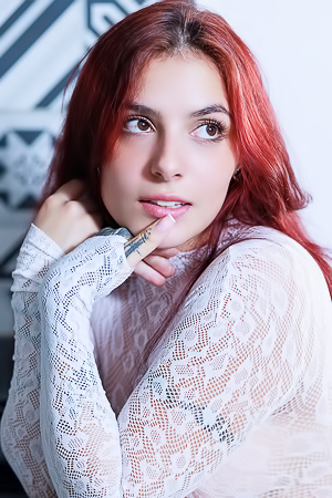 Ultravioleta Strikes a Pose, Smiling in the Midnight Kitchen with Tattoos
