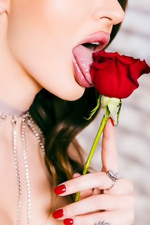 Ella Reese in silk robe feels roses with bare skin